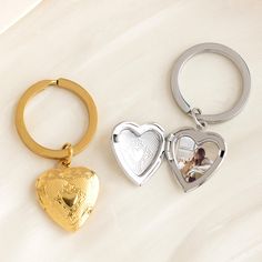 Customizable Photo Heart Locket Keychain, Photo Small Locket Keychain, Cute Keychain, Anniversary Gift, Friendship Gift, Gift for Her 🌟Color: gold, silver 🌟Pendant size: 19×18.7MM 🌈This customizable photo heart locket Keychain is a unique piece of jewelry designed to hold and display cherished memories close to the heart. More than just a fashionable accessory, this keychain serves as a personalized keepsake that allows the wearer to carry a meaningful photo of a loved one wherever they go. Available on Etsy, it's an ideal gift choice for those seeking to express love, friendship, or family bonds in a deeply personal way. 💡Highlights: ✨Personalized Memory Holder: The heart-shaped locket can be opened to insert a small, special photo, allowing the wearer to keep a treasured memory close Locket Keychain, Keychain Photo, Meaningful Photos, Photo Cropping, Silver Keychain, Keychain Cute, Cute Keychain, Photo Heart, Heart Locket