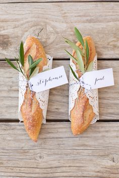 an image of two breads with leaves on them