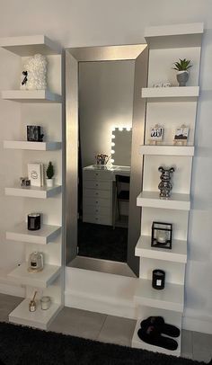 a mirror and some shelves in a room