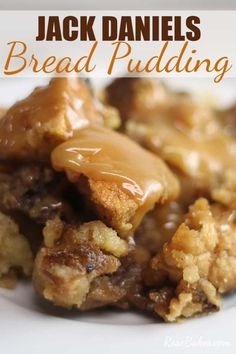 a close up of bread pudding on a plate with caramel drizzl