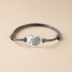 "♥ Heart Fingerprint Bracelet ♥ This heart fingerprint bracelet is a perfect way to show her your love. It also will can be a beautiful memorial keepsakes for a Mommy or Grandma gift using the children or grandchildren's prints. P R O D U C T ∙ I N F O * Material: Solid 925 Sterling Silver * Finishing: Silver - Yellow Gold - Rose Gold * Heart tage measures approx. 3/4'' x 5/8'' (19x16mm) * It is adjustable to fit most wrist sizes. H O W * T O * O R D E R * Select your preferred color and engravi Fingerprint Memorial, Fingerprint Jewelry Memorial, Thumbprint Jewelry, Fingerprint Heart, Grammy Gift, Grandmother Jewelry, Diamond Pendants Designs, Memorial Ring, Urn Jewelry