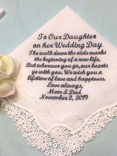 a wedding handkerchief with a rose on it and the words i'm our daughter on her wedding day