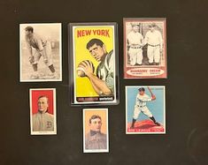 a collection of baseball cards on display in a case