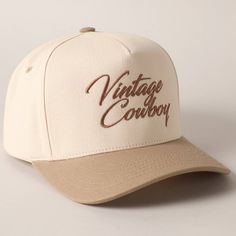 Vintage Cowboy Embroidery Two-Tone Baseball Cap - "Vintage Cowboy" Text Embroidery - 5 Panel Canvas Baseball Cap - 100% Cotton - Adjustable Buckle Closure - Embroidered In USA *One Size Fits All - Adjustable Strap Makes Fit Comfortable.* The VANTAGE Two-Tone Embroidery Trucker Hat blends style and functionality with its distinctive design. The hat features a two-tone color scheme, combining a vibrant or contrasting color on the front panels with a complementary. The embroidered detailing on the Hats Classy, Brown Cotton Trucker Hat With Embroidered Logo, Vintage Trucker Hat With Embroidered Logo, Vintage Baseball Cap With Embroidered Logo, Vintage Trucker Hat With Embroidered Patch, Vintage Baseball Cap With Embroidered Patch, Cowboy Embroidery, Text Embroidery, Embroidery Baseball