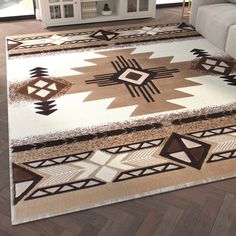 an area rug with brown and white designs on it