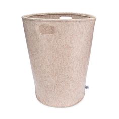 a large beige felt storage bin with handles on the top and bottom, in front of a white background