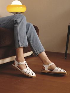 Editor's NotesMOL:pin's shoes can be matched well with girlish and casual stylings.- Trendy square shaped toe- Fisherman designed sandals- Soft and smooth cowskin- Easy to wear with buckle strapMeasurements(in.)KR size- Size: KR 225MM (US 5.5) - KR 255MM (US 8.5)- Heel height: 0.39 in.Composition & Care- Upper: Cowskin, Lining: Functional Lining- Avoid direct heat and moisture- The leather may have fine scratches and wrinkles- Keep in a dust bagDesigner- by MOL:pin Leather Slip-on T-strap Sandals For Spring, Casual T-strap Sandals With Rubber Sole For Spring, Classic Closed Toe T-strap Sandals For Summer, Classic T-strap Sandals With Round Toe For Spring, Trendy Leather T-strap Sandals For Spring, Classic Round Toe T-strap Sandals For Spring, Modern Closed Toe T-strap Sandals For Spring, Trendy Leather Slingback Sandals With Round Toe, White Closed Toe T-strap Sandals With Buckle