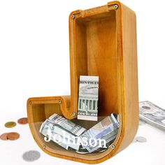 a wooden case with money in it