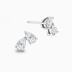 A sight to behold, these Two-Stone Pear-Cut Diamond Stud Earrings draw inspiration from the splendour of old-world elegance. Each ethical diamond is adorned with utmost care and attention by Ecksand's team of highly skilled craftspeople for a mesmerizing result that stays true to its promise to last forever. Post length: 11 mm approx.Backing: Butterfly push backs Types Of Diamonds, Pear Cut Diamond, Diamond Stud Earrings, Diamond Stud, Recycled Gold, Rose Gold Diamonds, Pear Cut, Conflict Free Diamonds, Diamond Earrings Studs