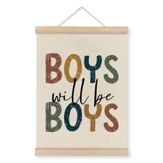 a wooden sign with the words boys will be boys written in multicolored letters