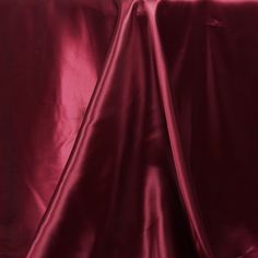 an image of a plain maroon cloth