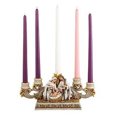 three candles with an image of the virgin mary and baby jesus on them in front of a white background