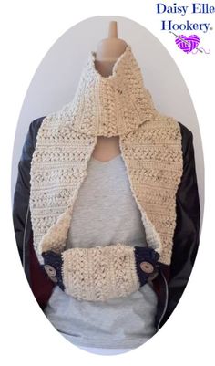 a crocheted scarf on top of a mannequin