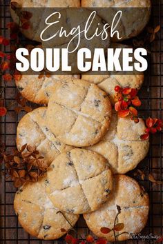 an image of english soul cakes on a cooling rack with autumn leaves and berries around it