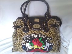 Large Steampunk/ Goth bag -  fabulous boutique Really funky carrybag in Leopard print patent PVC with skulls & roses design to front "For the love of fashion" Comes with Black PVC handles, metal clasp fastening with zip / buckles and pretty glass beads Contrasting leopard print lining with zip pockets W 17 inch H 12 Inch D 8 Inch Purse Insert, Skulls And Roses, Purses And Handbags, Glass Beads, Boutique, Accessory Gift, Electronic Accessories, Purses And Bags, Music Clothes