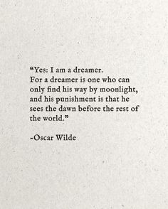 oscar wilde quote about dreaming and dreams on white paper with black ink in the middle