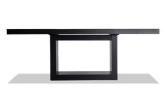 a black table sitting on top of a white floor