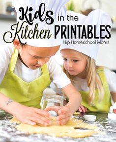 two children in chef's hats are making cookies