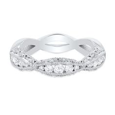 a white gold wedding band with round diamonds