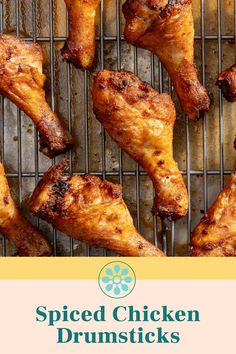 grilled chicken drumsticks on a grill with the title spiced chicken drumsticks