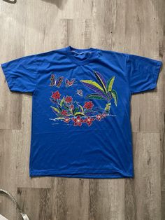 Vintage Batik Shirt  - Batik style  - Hawaiian Art tee  - Butterfly graphic  - Floral design  - Single stitch  Size: Large (missing tag)  Good vintage condition  No rips or holes  No stains Batik Butterfly, 90s Art, Hawaiian Art, Graphic Floral, Batik Shirt, Butterfly Graphic