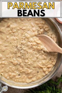 a pan filled with beans and topped with parmesan seasoning on the side