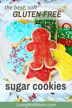 the best soft gluten - free sugar cookies on a plate with sprinkles