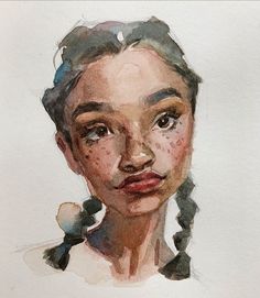 a watercolor painting of a woman's face