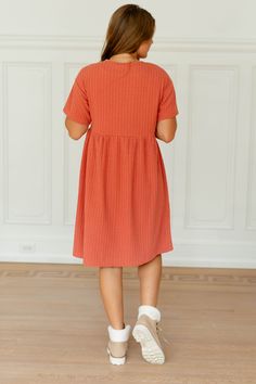 Feel comfortable without sacrificing style in this modest length midi dress that is perfect for the late summer season! The unique textured knit fabric makes the 'Reese' standout, while still maintaining the classic t-shirt dress style. Layer with a sweater for a cozy look, or add a denim jacket for an elevated chic! 93% Polyester, 7% Spandex Unlined Hand Wash Cold Separate Hang or Lay Flat to Dry Do Not Bleach Low Iron If Needed Maternity/Bump Friendly! FINAL SALE: NOT ELIGIBLE FOR RETURN OR EX Shirt Dress Style, Layered Tops, Knit Midi, Knit Midi Dress, Low Iron, Late Summer, Skirt Leggings, Textured Knit, Summer Season