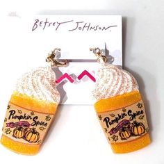 the earrings are made out of plastic and have frosted pumpkin spice on them,