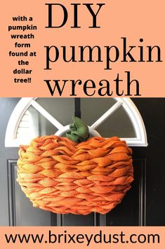 a pumpkin wreath hanging on the front door with text overlay that reads, diy pumpkin wreath