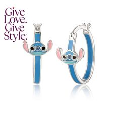 the disney character hoop earrings are blue and pink with ears on each side, one is wearing