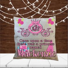 a pillow with a princess carriage on it that says once upon a time, there was a princess named mackenzie