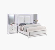 a white bed sitting next to a dresser with drawers and mirror on top of it