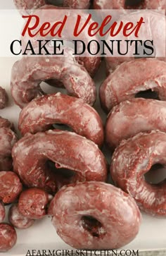 red velvet cake donuts are piled on top of each other with the words, red velvet cake donuts above them