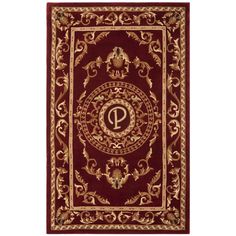 a red and gold rug with the letter c on it's center medallion design