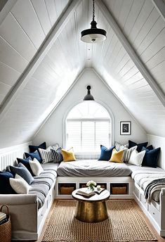 a living room filled with lots of furniture under a vaulted skylight in a loft