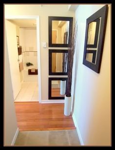 the hallway is clean and ready to be used as a place for pictures or photographs