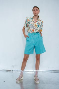 🇺🇸 US SHOPPERS - due to the situation with the post in United States, your order can take up to 3 months to arrive. Please be warned ‼️  Vintage cyan blue taylored shorts / Midi above the knee lenght high waisted bright shorts. TAG: Tail SIZE ON THE TAG: 8 MEASUREMENTS (measured lying flat)   lenght: 51 cm / 20''   waist: 35 cm / 13.5''   inseam: 22 cm / 8.5'' LELDE is 177 cm / 5'8'' tall and wears size 36/S.  CONDITION: excellent. FOLLOW US ON INSTA FOR JUICY UPDATES   https://www.instagram.com/ginger.inn/ Spring High-waisted Bermuda Shorts With Built-in Shorts, Trendy Knee-length Shorts For Summer, Trendy Knee-length Summer Shorts, Fitted Bermuda Bottoms For Summer, Trendy Bermuda Bottoms With Built-in Shorts, Green Bermuda Shorts With Built-in Shorts For Summer, High Waist Green Shorts For Summer, Bermuda Shorts For Summer, Trendy Bermuda Shorts With Pockets