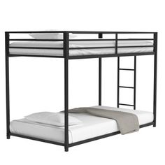 a black metal bunk bed with white sheets and pillows on the bottom level, against a white background