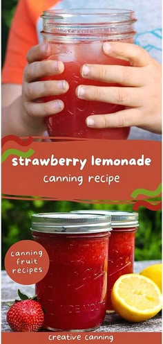 a person holding a jar filled with strawberry lemonade next to some strawberries and lemons