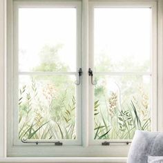 two windows with plants drawn on them in front of a window sill, one is open and the other is closed