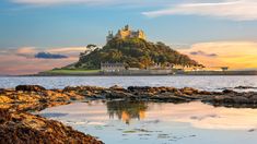 an island with a castle on top of it