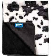 a black and white animal print blanket with the word pow on it's side