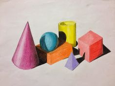 colored pencils and shapes on white paper