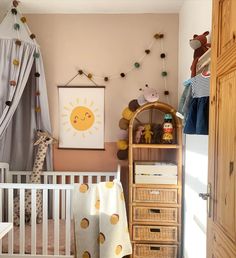 a baby's room with a crib and toys