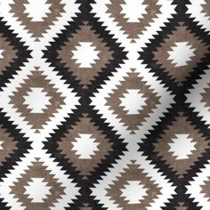 a brown and white background with an abstract pattern in the shape of diamonds on it