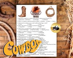 the cowboy trivia is on top of a wooden table next to some rope and other items