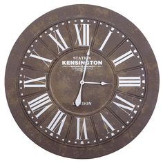 a large metal clock with roman numerals