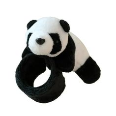 a black and white stuffed panda bear on a rubber band with its head hanging down